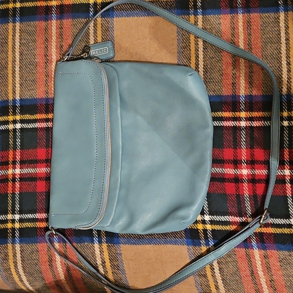 Relic Blue Crossbody Bag with Rounded Shape and Adjustable Strap